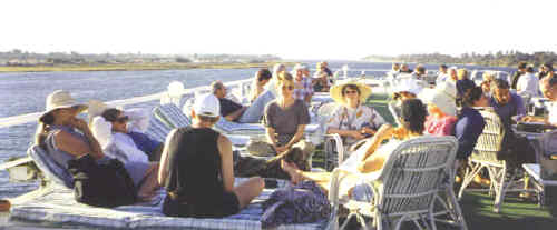 Relaxing on the Nile, Egypt. Ruth Shilling and group, Feb 2000.