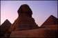 Sunset at the Sphinx and Giza pyramids